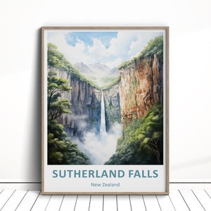May include: A framed print of a watercolour painting depicting Sutherland Falls in New Zealand. The painting shows a tall waterfall cascading down a steep cliff face, surrounded by lush green foliage and a cloudy sky.
