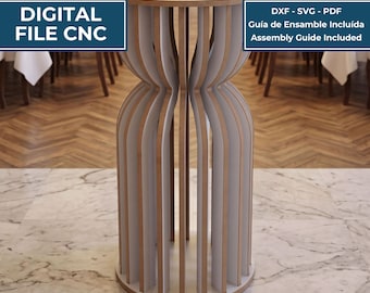 May include: A digital file for a CNC pedestal table featuring a circular top and a base constructed from vertical, curved wooden slats. The design includes text labels: MESA PEDESTA / PEDESTAL TABLE, DIGITAL FILE CNC, DXF - SVG - PDF, and Assembly Guide Included.