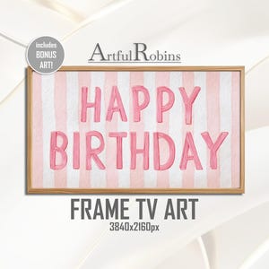 May include: A framed digital art print with the words "HAPPY BIRTHDAY" in pink, set against a pink and white striped background. The frame is a light brown color. The text "FRAME TV ART" is below the frame.