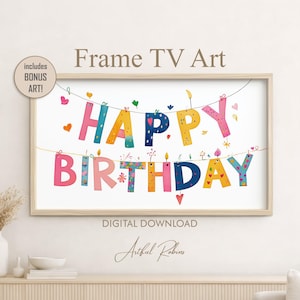 May include: A rectangular wooden frame displaying digital art with the text HAPPY BIRTHDAY in colorful, patterned letters hanging from strings. The design includes small heart and star accents. A circular badge in the corner reads includes BONUS ART!