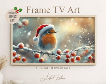 May include: A digital download Frame TV art display featuring a robin wearing a red and white Santa hat perched on a snowy branch with red berries. The text reads Frame TV Art, includes BONUS ART!, and DIGITAL DOWNLOAD with Artful Robins below.