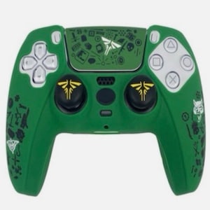 May include: A green video game controller featuring a central touchpad with a white firefly logo and various small black icons. The two black analogue sticks are marked with yellow firefly symbols, and the buttons are white with standard symbols.