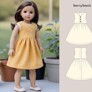 May include: A doll wearing a yellow dress with white trim and white shoes. The dress has three buttons down the front. The text "berry basic" is in the upper right corner, with a diagram of the dress.