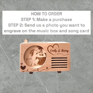 May include: A wooden music box shaped like a vintage radio with a photo of a couple kissing engraved on the front. The music box has a heart-shaped design with the text "Emilly & Barry" engraved on it.