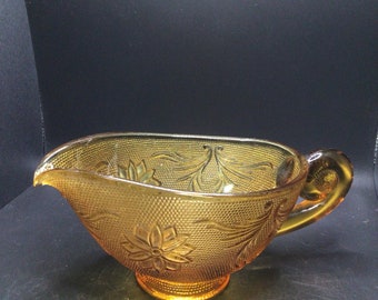 Vintage Tiara gravy boat. Amber in color.