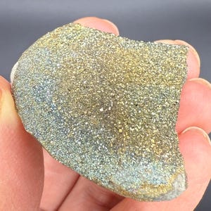 Sparkling rainbow pyrite on matrix from Russia. Natural sparkly colorful pyrite nodule specimen. Rocks Minerals Crystals