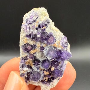 Purple fluorite on matrix from Yaogangxian, China. Rocks Minerals Crystals