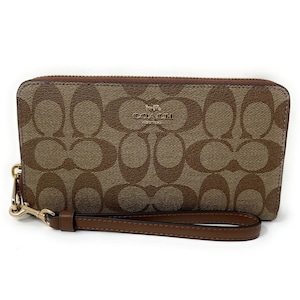 COACH Women Long Zip Around Wallet in Signature Canvas With Strap