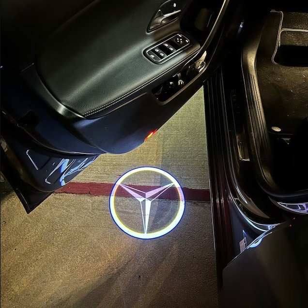 Mercedes benz 2024 door light logo