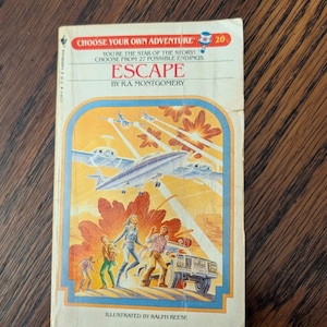 May include: A vintage Choose Your Own Adventure book titled Escape by R.A. Montgomery, number 20 in the series. The cover features a colorful illustration of a twin-engine airplane flying over a desert scene with three figures and a vehicle.