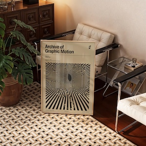 May include: A rectangular framed poster titled Archive of Graphic Motion with a beige background and a black and white radial sunburst pattern. The text includes Issue 28 Spring 2023, Archive No. 75877, and Collection of Experimental Visual Systems.