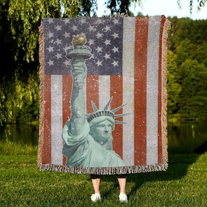 Manta tejida americana: tapiz con la bandera de EE. UU. y la Estatua de la Libertad