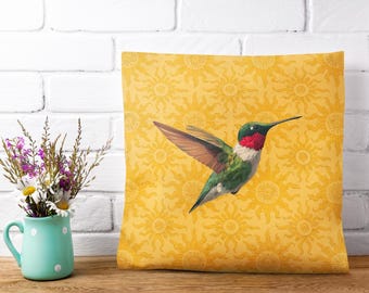 Cojín de exterior amarillo con diseño de colibrí: decoración para patio resistente a los rayos UV y al agua.