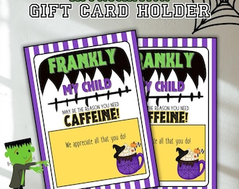 May include: Two purple and white striped gift card holders with a Halloween theme. The front of each card holder features a black monster with the text "Frankly My Child May Be The Reason You Need Caffeine!" and a cartoon image of a witch's cauldron with a spider web. The text "We appreciate all that you do!" is printed below the image.