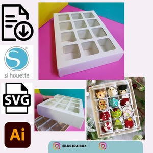 Könnte beinhalten: Weiße Pappbox mit 16 quadratischen Fächern, perfekt zum Organisieren kleiner Gegenstände. Die Box ist leer und hat auf jedem Fach ein transparentes Plastikfenster. Die Box steht auf einer rosa Oberfläche.