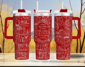 May include: Red insulated tumbler with a white lid, handle, and straw. The tumbler features a white illustration of bookshelves and the text "Reading is Dreaming with Your Eyes Open".