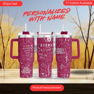 May include: A personalized, pink stainless steel tumbler with a white lid and a white straw. The tumbler has a design of physical therapy related icons and the text "Physical Therapy Assistant". The tumbler is also personalized with the name "Susan" and the text "You're going tibia ok".