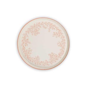 May include: Round, off-white serving tray with a floral design in coral. The tray has a coral-colored rim and a delicate floral pattern around the edge. The tray is suitable for serving food or as a decorative piece.