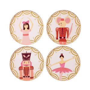 May include: Set of four round coasters with a white background and gold trim. Each coaster features a different illustration of characters from The Nutcracker ballet, including a ballerina, a mouse, and a nutcracker.