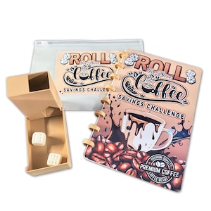 May include: A beige dice box with two white dice, a clear pouch, and a spiral-bound notebook. The notebook and pouch feature the text "Roll the Dice Coffee Savings Challenge" with coffee-themed graphics. The notebook has a coffee cup illustration.