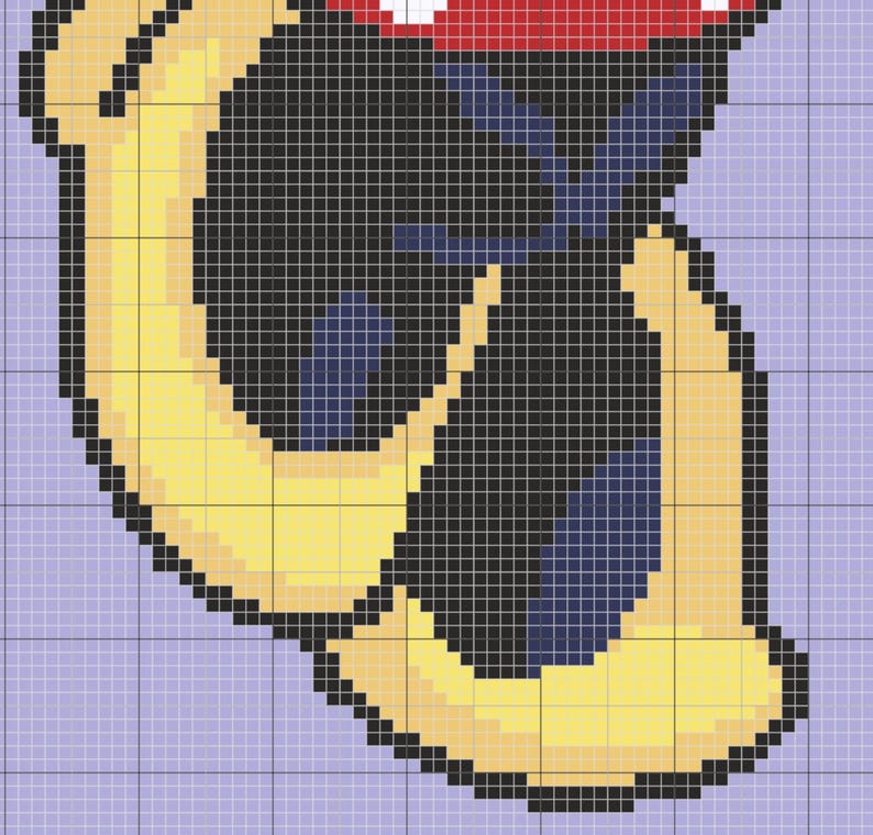 May include: A pair of yellow and orange slippers with a blue and black design. The slippers are on a purple background.