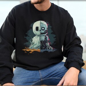 May include: A black sweatshirt with a graphic print of a ghost and a robot. The ghost is white and the robot is gray and silver. The graphic is in the center of the sweatshirt.