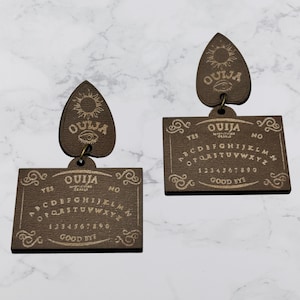 Channel the Other Side with these Spirit Board Earrings for Halloween