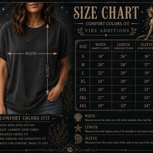 May include: A charcoal gray t-shirt displayed with a size chart featuring measurements in inches for sizes S through 4XL. The chart details width, length, and sleeve measurements, alongside text specifying 100% ring-spun cotton fabric.