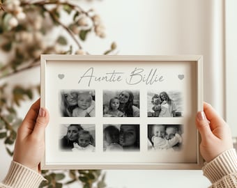 May include: A framed photo collage featuring six black and white images. The text "Auntie Billie" is centered above the photos, with a heart on each side. The frame is a light neutral color.
