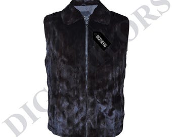 May include: A black fur vest with a collar and a zipper closure. The vest has a tag that says "DIGITALLORS". The vest is a dark color and appears to be made of a soft material.