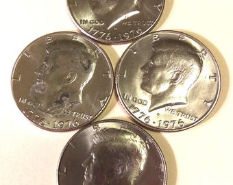 1776-1976 D Kennedy Half Dollar in AU condition Set of 4 coins enclosed hard plastic