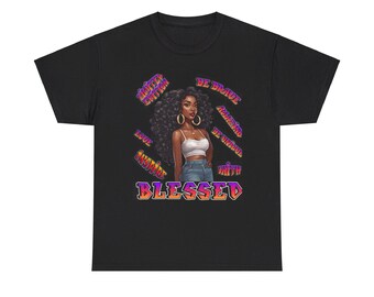 May include: A black t-shirt featuring a graphic of a person with voluminous dark hair, wearing a white crop top and blue jeans. The design includes the text BLESSED, LIMITED EDITION, BE BRAVE, AMAZING, BE UNIQUE, LOVE, INSPIRE, and FAITH.