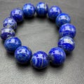 Lapis Lazuli Bracelet: 15-17mm Round Natural Gemstone Beads from Afghanistan product logo