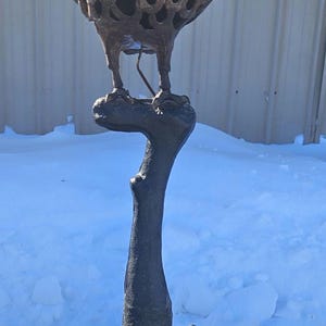 May include: A rustic wooden sign with the text "Welcome to our home" in white lettering. The sign features a distressed finish and a simple, inviting design, perfect for a front porch or entryway.