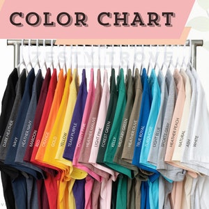 May include: Color chart showing 24 different t-shirt colors, including black, navy, maroon, red, orange, gold, yellow, team purple, charity pink, heather mauve, light pink, forest green, kelly, military green, heather olive, true royal, turquoise, light blue, sports gray, heather peach, natural, ash, and white.