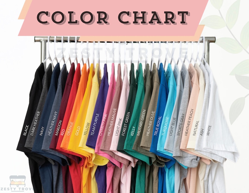 May include: Color chart showing 24 different t-shirt colors, including black, navy, maroon, red, orange, gold, yellow, team purple, charity pink, heather mauve, light pink, forest green, kelly, military green, heather olive, true royal, turquoise, light blue, sports gray, heather peach, natural, ash, and white.