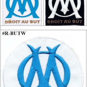 May include: Three embroidered patches featuring the Olympique de Marseille logo. The patches display the team's emblem in blue and white, with the text "DROIT AU BUT". One patch is on a white background, another on black, and the third on a white circular background.