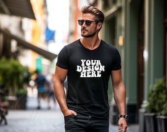 May include: A man wearing a black t-shirt with the text "YOUR DESIGN HERE" in white retro font. He is wearing sunglasses and has a beard.