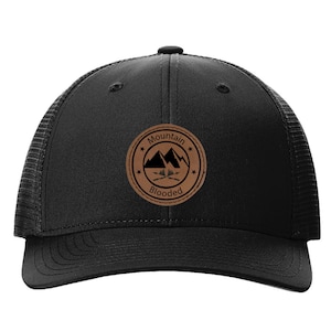 Mountain Blooded Performance Trucker Hat | Stylish Outdoor Cap with Leather Patch | Perfect Gift for Adventurers & Nature Lovers.