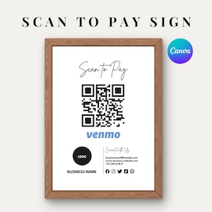 Pode incluir: Um letreiro emoldurado com o texto "SCAN TO PAY SIGN" no topo. O letreiro inclui um código QR, a palavra "venmo" em azul e informações de contato. O letreiro está em uma moldura de madeira.