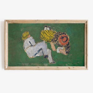 May include: An abstract painting featuring two figures on a green background. One figure is wearing a yellow hat and light-colored clothing, while the other is wearing a red hat and patterned clothing. The artwork is framed in a light-colored wooden frame.