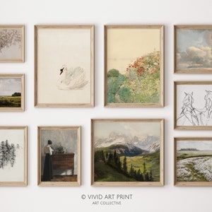 May include: A gallery wall with nine framed prints. The prints feature a variety of subjects, including a swan, a landscape with flowers, a mountain range, and a forest. The prints are all in different styles and colors, and they are arranged in a visually appealing way.