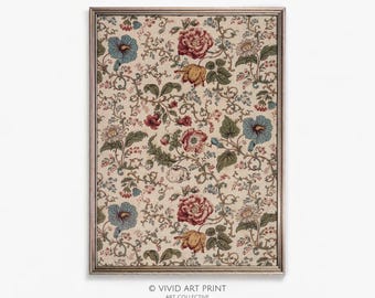 May include: A framed print with a vintage floral pattern featuring red, blue, and yellow flowers on a cream background. The frame is silver.