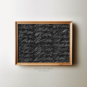 May include: A black and white abstract art print in a wooden frame. The print features a series of white lines on a black background. The print is titled "VIVID ART PRINT ART COLLECTIVE".