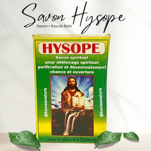 May include: A green and yellow box with the words "HYSOPE" and "Savon spirituel" printed on it. The box features a picture of Jesus holding a book and a waterfall. The text "@kameanature" is printed on the side of the box.