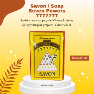 May include: A yellow and red soap bar with the text "Savon / Soap Seven Powers 7777777" and "KAMEA NATURE" on the packaging. The soap bar is in the shape of a pyramid with the letters "A, E, E, S, A, T, H, H, I, I, M, 0, 0, 0, 0, r, r, r, r, r, r" arranged in a pyramid shape.