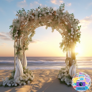 May include: A wooden wedding arch decorated with white flowers and greenery stands on a sandy beach. The arch is set against a backdrop of the ocean and a sunset sky. White fabric drapes from the arch.