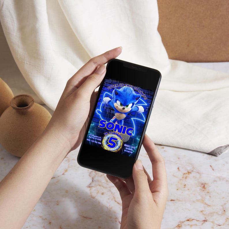 May include: A blue and black digital invitation for a Sonic the Hedgehog birthday party. The invitation features a cartoon image of Sonic running with the text "Gotta Go Fast To Party" and "Sonic is Turning 5".