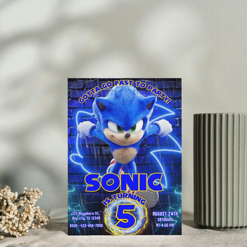 May include: A blue and yellow birthday party invitation featuring Sonic the Hedgehog. The invitation says "Gotta go fast to party!" and "Sonic is turning 5". The invitation also includes the date and time of the party: August 24th, Saturday at 4:00 PM.