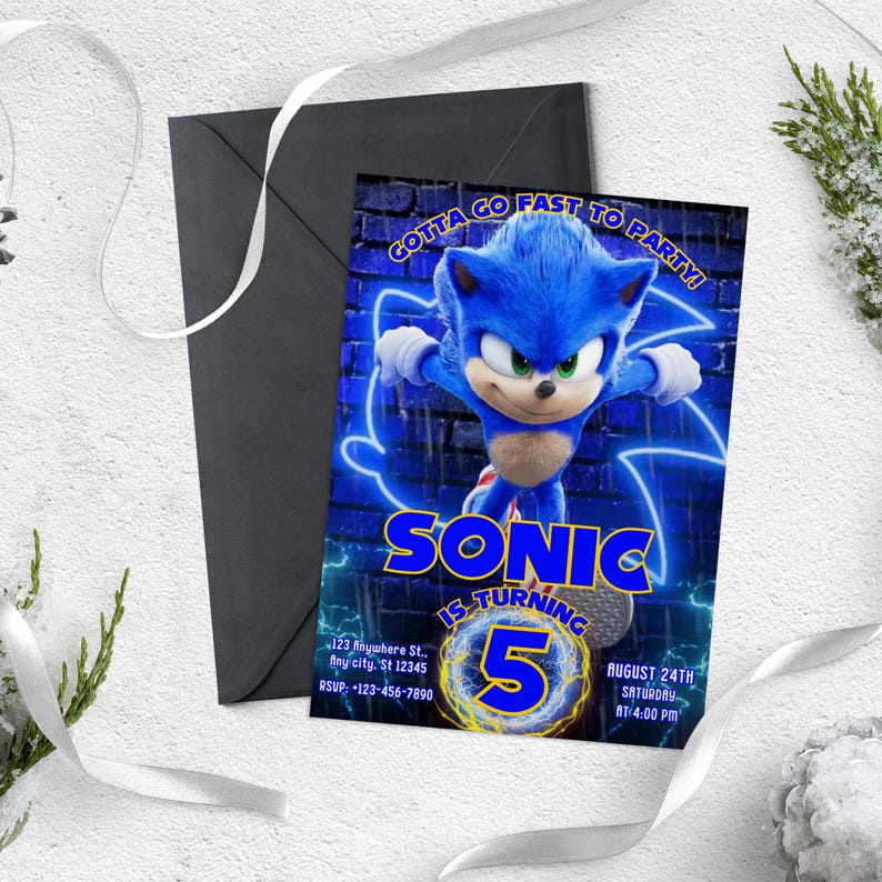 May include: A blue and yellow birthday invitation featuring Sonic the Hedgehog from the movie Sonic the Hedgehog 2. The invitation has a brick background with neon blue lightning bolts and the text "Gotta Go Fast To Party!" and "Sonic Is Turning 5".